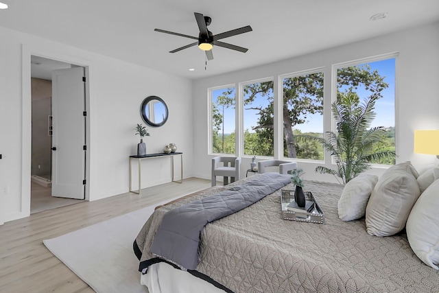 214 Ulupau Cir, Bastrop, TX 78602 - bedroom with wood finished floors, recessed lighting, and a ceiling fan