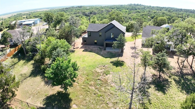 214 Ulupau Cir, Bastrop, TX 78602 - view from above of property with a heavily wooded area