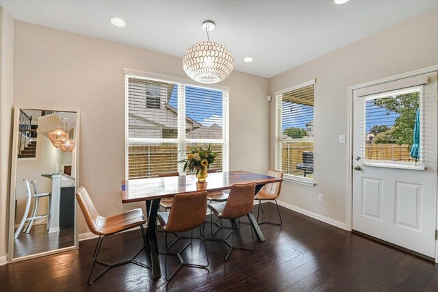 1812 Morts Pl, Manchaca, TX 78652 - dining area with baseboards, dark wood-style floors, a chandelier, and recessed lighting