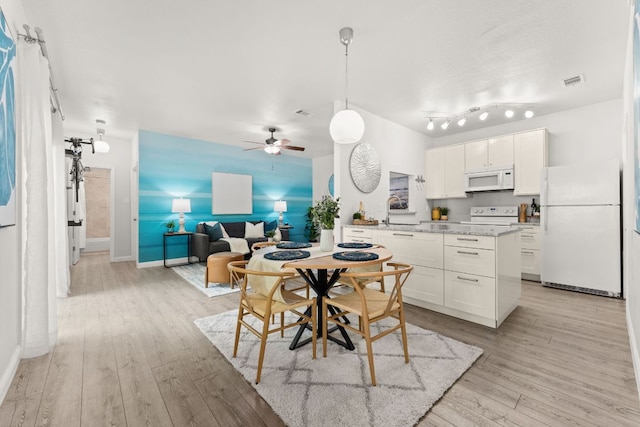 4015 Speedway Unit 1, Austin, TX 78751 - dining area featuring light wood-style floors and a ceiling fan