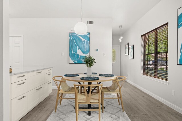 4015 Speedway Unit 1, Austin, TX 78751 - dining area with light wood-style flooring and baseboards