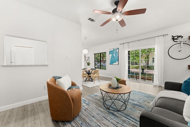 4015 Speedway Unit 1, Austin, TX 78751 - living room with wood finished floors, baseboards, a ceiling fan, and lofted ceiling