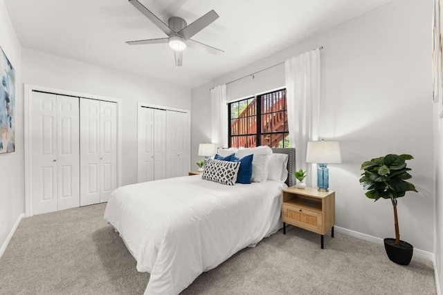 4015 Speedway Unit 1, Austin, TX 78751 - bedroom with light carpet, multiple closets, and a ceiling fan