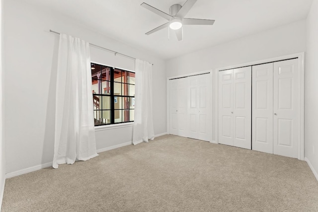 4015 Speedway Unit 1, Austin, TX 78751 - unfurnished bedroom featuring carpet floors, multiple closets, and ceiling fan