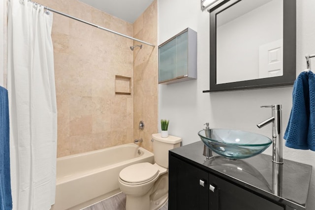 4015 Speedway Unit 1, Austin, TX 78751 - bathroom featuring shower / bath combo, vanity, and wood finished floors