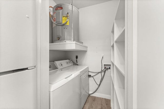 4015 Speedway Unit 1, Austin, TX 78751 - laundry area with electric water heater, light wood-type flooring, and washing machine and dryer