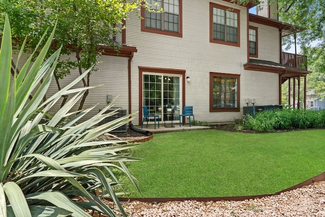 4015 Speedway Unit 1, Austin, TX 78751 - back of house featuring a yard and a patio