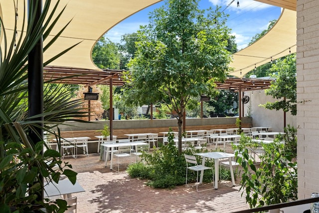 4015 Speedway Unit 1, Austin, TX 78751 - view of patio / terrace with a pergola and outdoor dining area