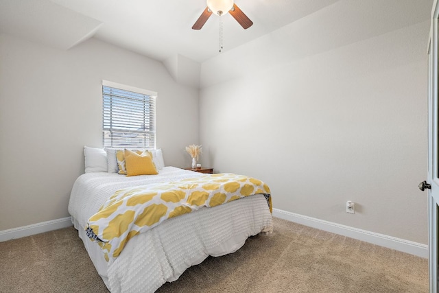 bedroom featuring carpet floors, baseboards, ceiling fan, and lofted ceiling