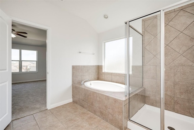 full bath featuring a stall shower, tile patterned flooring, a garden tub, lofted ceiling, and ceiling fan