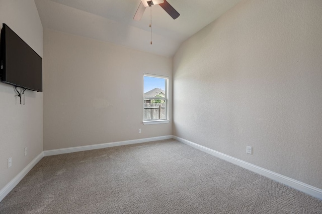 19817 Chayton Cir, Pflugerville, TX 78660 - spare room featuring ceiling fan, light carpet, vaulted ceiling, and baseboards