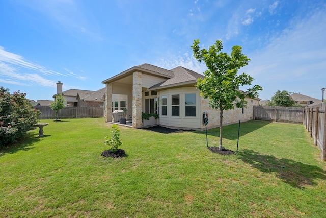 19817 Chayton Cir, Pflugerville, TX 78660 - rear view of property with stone siding