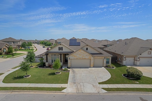 19817 Chayton Cir, Pflugerville, TX 78660 - view of front of house with a residential view, concrete driveway, board and batten siding, an attached garage, and roof mounted solar panels
