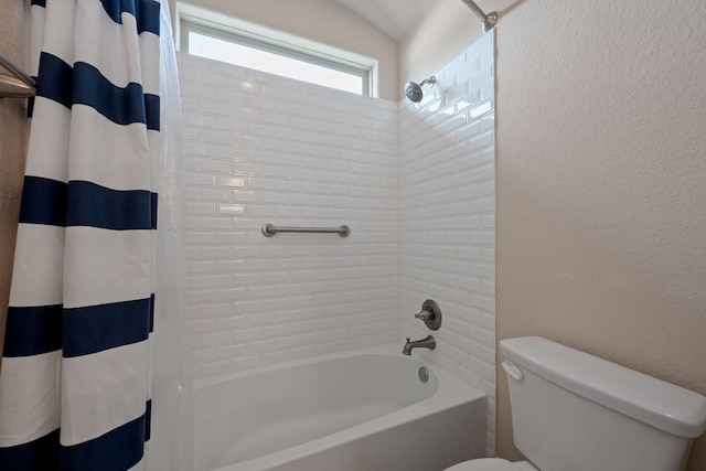 19817 Chayton Cir, Pflugerville, TX 78660 - full bathroom featuring toilet, shower / bath combo, and a textured wall