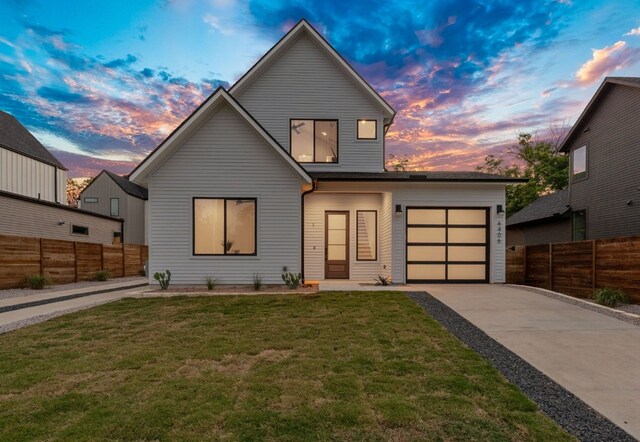 6406 Cannonleague Dr Unit 1, Austin, TX 78745 - view of front of house with concrete driveway and an attached garage