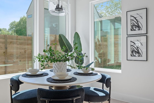 6406 Cannonleague Dr Unit 1, Austin, TX 78745 - dining area with healthy amount of natural light and a chandelier
