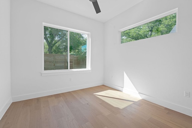 6406 Cannonleague Dr Unit 1, Austin, TX 78745 - empty room with ceiling fan, wood finished floors, and baseboards