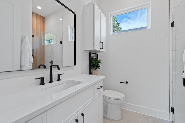 6406 Cannonleague Dr Unit 1, Austin, TX 78745 - bathroom with vanity, toilet, a stall shower, baseboards, and recessed lighting