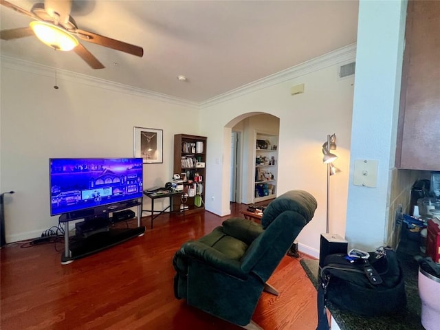 7701 Rialto Blvd Unit 1328, Austin, TX 78735 - living room with arched walkways, ornamental molding, wood finished floors, a ceiling fan, and baseboards