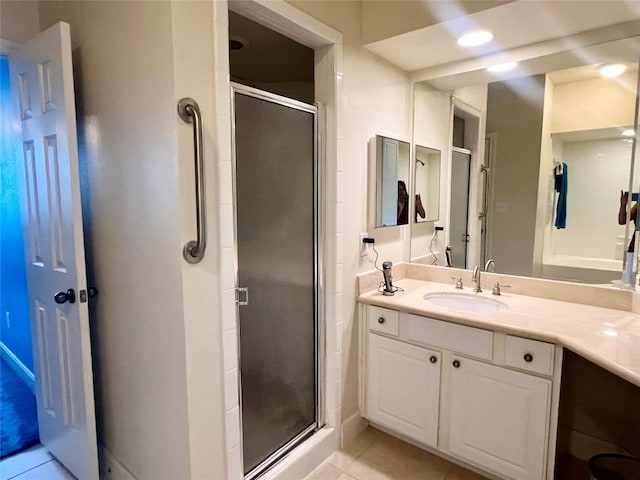 7701 Rialto Blvd Unit 1328, Austin, TX 78735 - bathroom with tile patterned flooring, a shower stall, and vanity