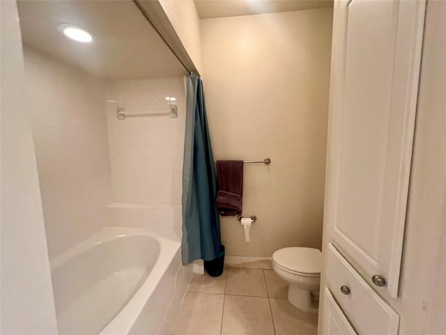 7701 Rialto Blvd Unit 1328, Austin, TX 78735 - bathroom featuring tile patterned floors, toilet, and shower / bath combination with curtain