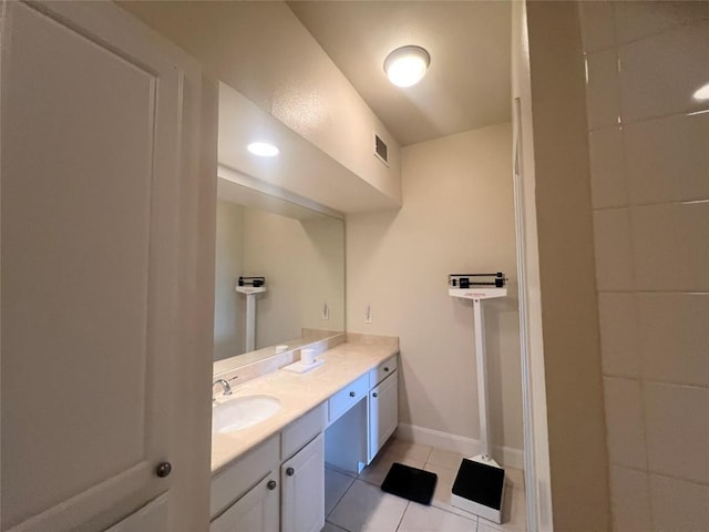 7701 Rialto Blvd Unit 1328, Austin, TX 78735 - bathroom featuring vanity, tile patterned floors, and baseboards