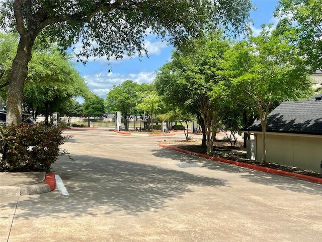 7701 Rialto Blvd Unit 1328, Austin, TX 78735 - surrounding community with a gate