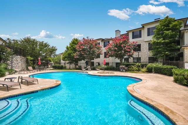 7701 Rialto Blvd Unit 1328, Austin, TX 78735 - community pool with a patio