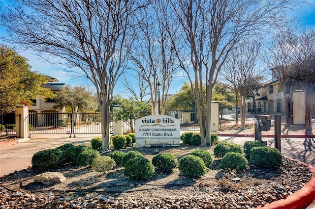 7701 Rialto Blvd Unit 1328, Austin, TX 78735 - community sign featuring a gate