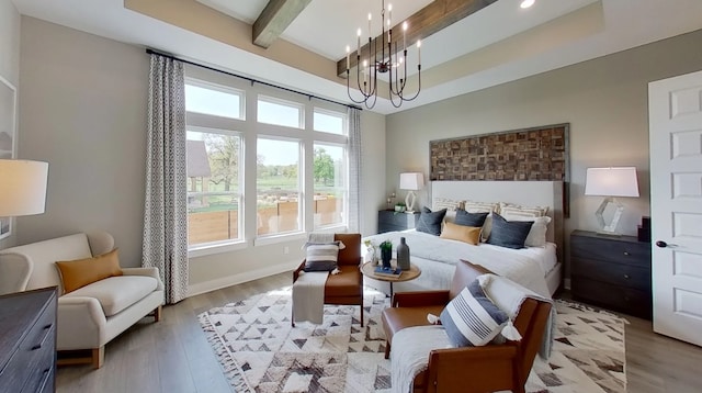 1026 Painted Horse Dr, Georgetown, TX 78633 - bedroom with a chandelier, light wood-style floors, baseboards, beam ceiling, and recessed lighting