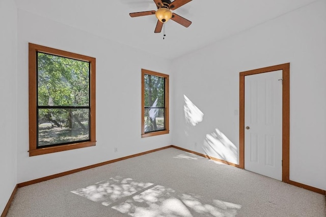 16704 Post Oak Gln, Austin, TX 78737 - empty room featuring carpet flooring, a ceiling fan, and baseboards