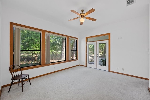 16704 Post Oak Gln, Austin, TX 78737 - empty room featuring healthy amount of natural light, baseboards, and french doors