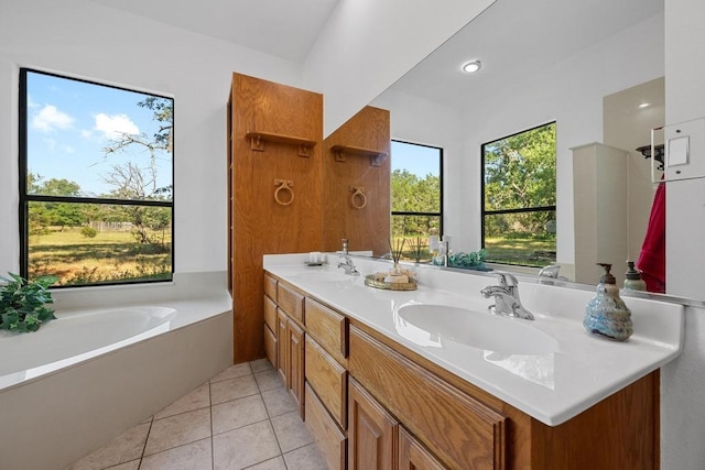 16704 Post Oak Gln, Austin, TX 78737 - bathroom with double vanity, tile patterned flooring, and a bath