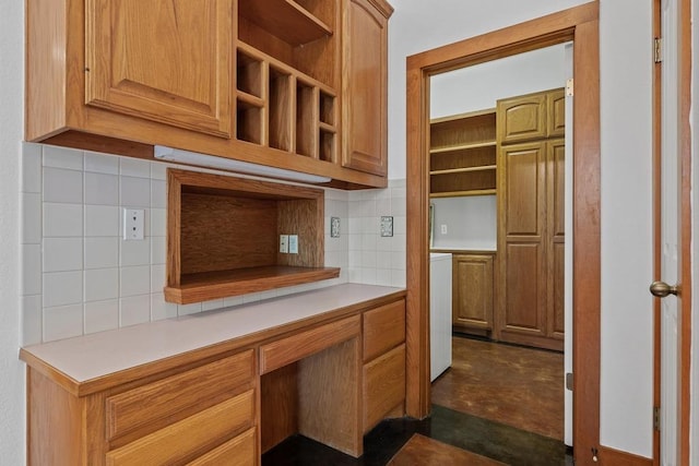 16704 Post Oak Gln, Austin, TX 78737 - kitchen with open shelves, light countertops, decorative backsplash, and concrete floors