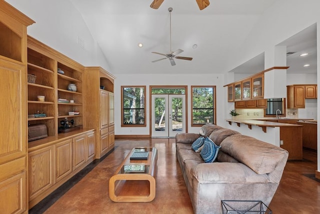 16704 Post Oak Gln, Austin, TX 78737 - living room with ceiling fan, vaulted ceiling, concrete flooring, and recessed lighting