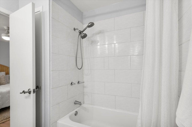 full bathroom with shower / tub combo with curtain