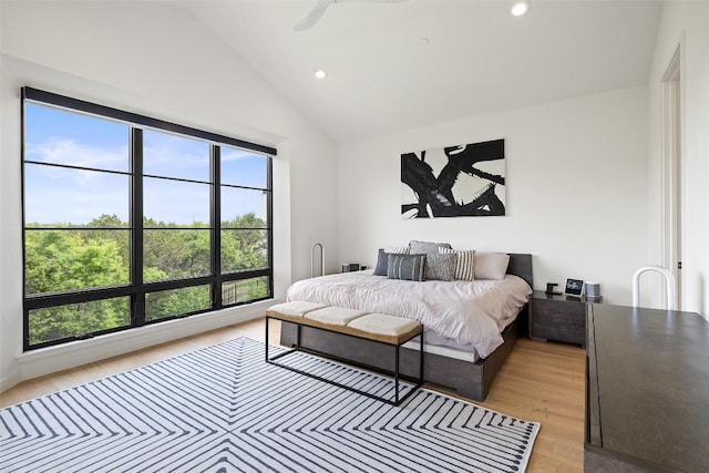 903 Alexia Ln, Austin, TX 78746 - bedroom featuring lofted ceiling, recessed lighting, and light wood-type flooring