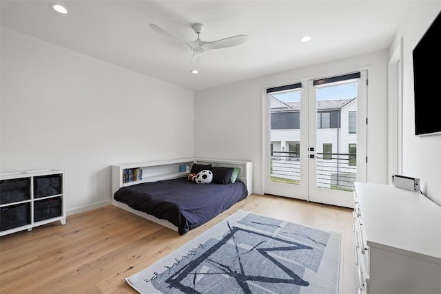 903 Alexia Ln, Austin, TX 78746 - bedroom featuring access to exterior, light wood-style flooring, recessed lighting, ceiling fan, and french doors