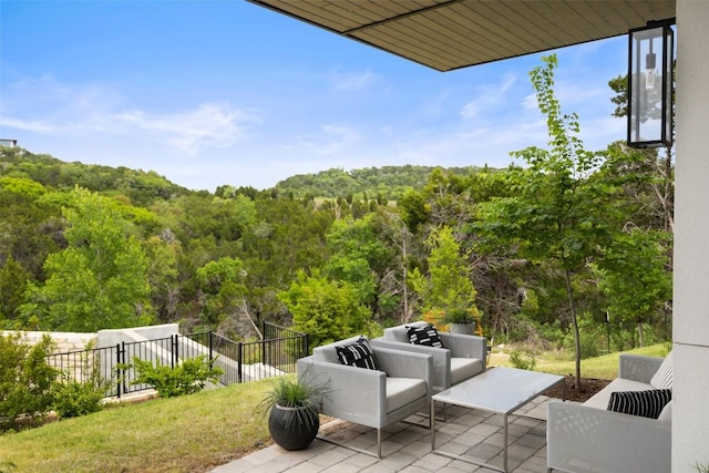 903 Alexia Ln, Austin, TX 78746 - view of patio / terrace with outdoor lounge area and a view of trees