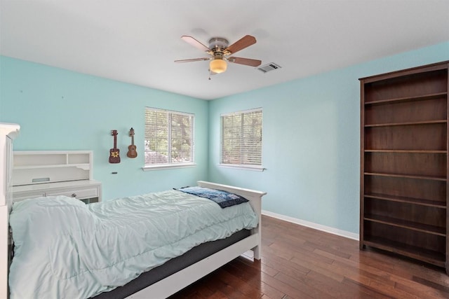 17112 Crescent Heights Trl, Austin, TX 78717 - bedroom with dark wood-type flooring, baseboards, and ceiling fan