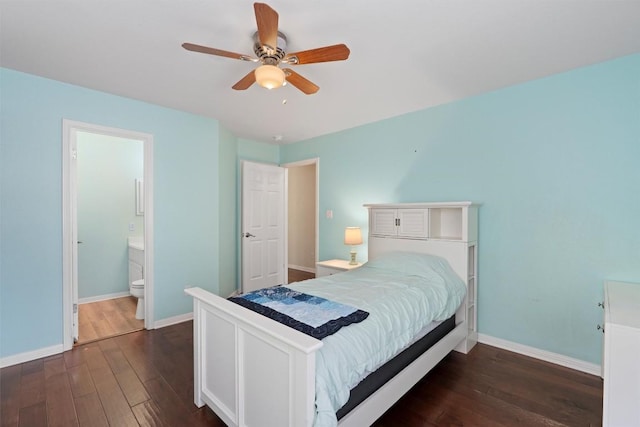 17112 Crescent Heights Trl, Austin, TX 78717 - bedroom with dark wood-style flooring, baseboards, ensuite bathroom, and a ceiling fan