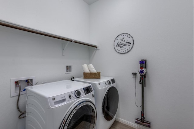 1314 Overture Pl, Round Rock, TX 78681 - laundry area with washer and dryer and baseboards