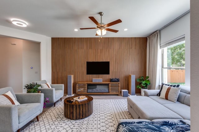 1314 Overture Pl, Round Rock, TX 78681 - living room with an accent wall, recessed lighting, and ceiling fan