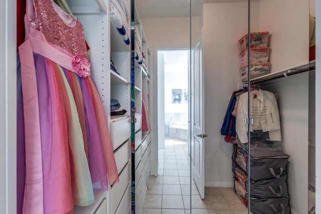 1314 Overture Pl, Round Rock, TX 78681 - walk in closet with light tile patterned floors