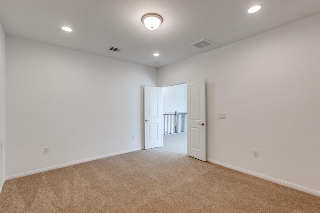 1314 Overture Pl, Round Rock, TX 78681 - unfurnished room featuring light colored carpet, baseboards, and recessed lighting