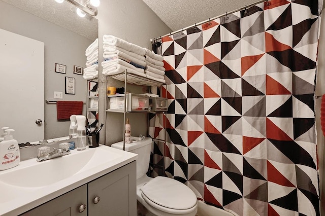 5405 Rose Hill Cir, Austin, TX 78745 - bathroom with a textured ceiling, vanity, and a shower with shower curtain