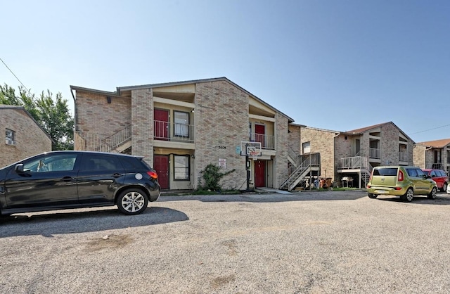 5405 Rose Hill Cir, Austin, TX 78745 - view of front of home featuring brick siding and stairs