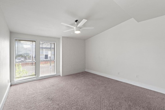 909 Reinli St Unit 101, Austin, TX 78751 - spare room with a ceiling fan, carpet flooring, and baseboards