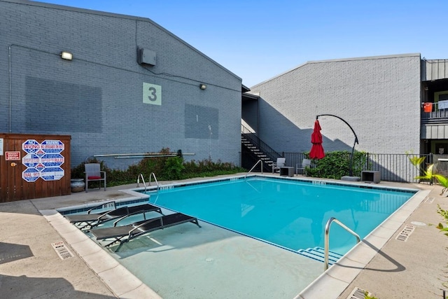 909 Reinli St Unit 101, Austin, TX 78751 - community pool featuring stairway and a patio area
