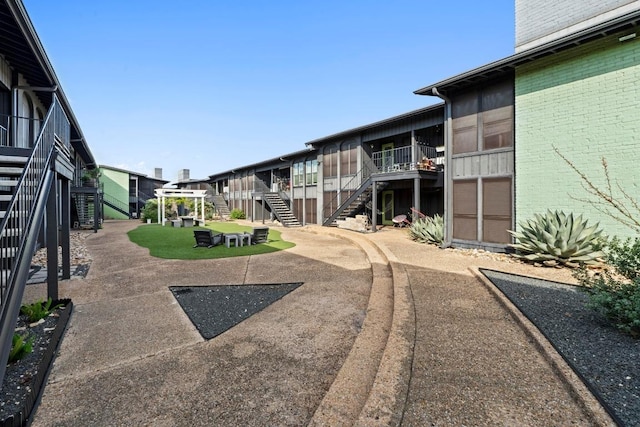 909 Reinli St Unit 101, Austin, TX 78751 - view of property's community with stairway